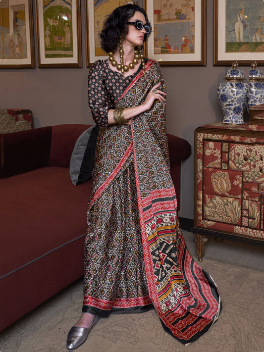 Black color satin crepe patola printed saree for women price
