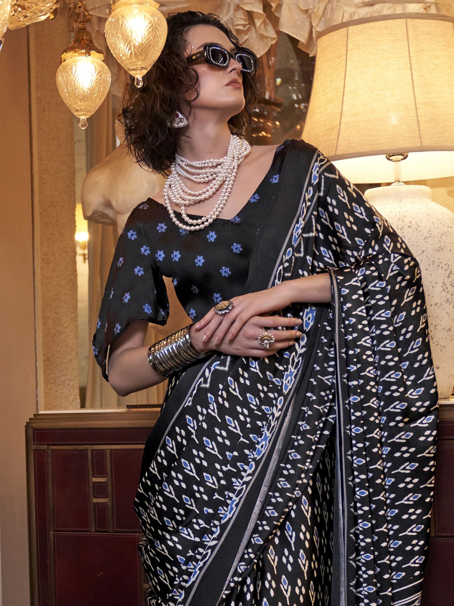 Black color satin crepe patola printed saree images
