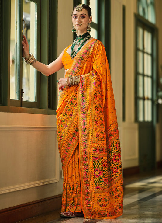 Orange color banarasi silk saree for women