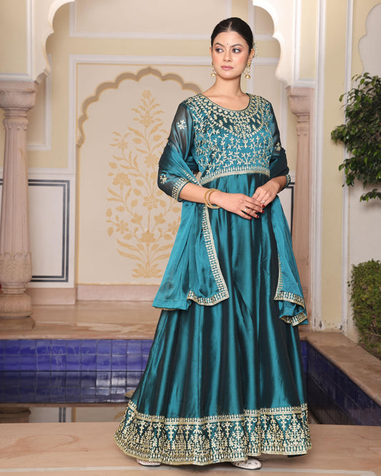 Rama color rangoli silk gown for women