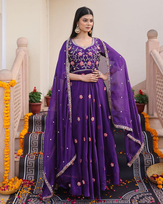 Purple color rangoli silk gown for women