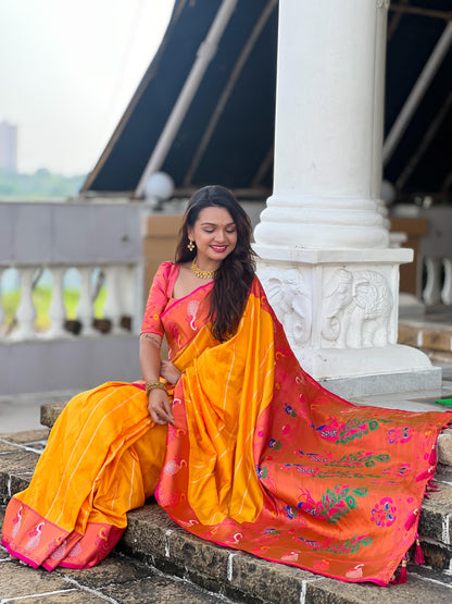 Yellow color paithani silk saree for women images

