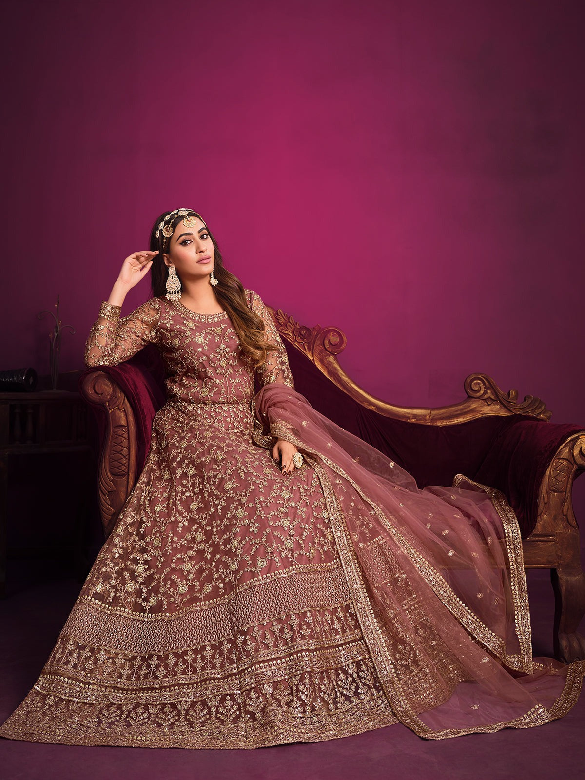 Pink color net embroidery work gown for engagement