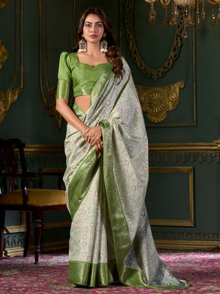 Green color dola silk foil printed saree for women price
