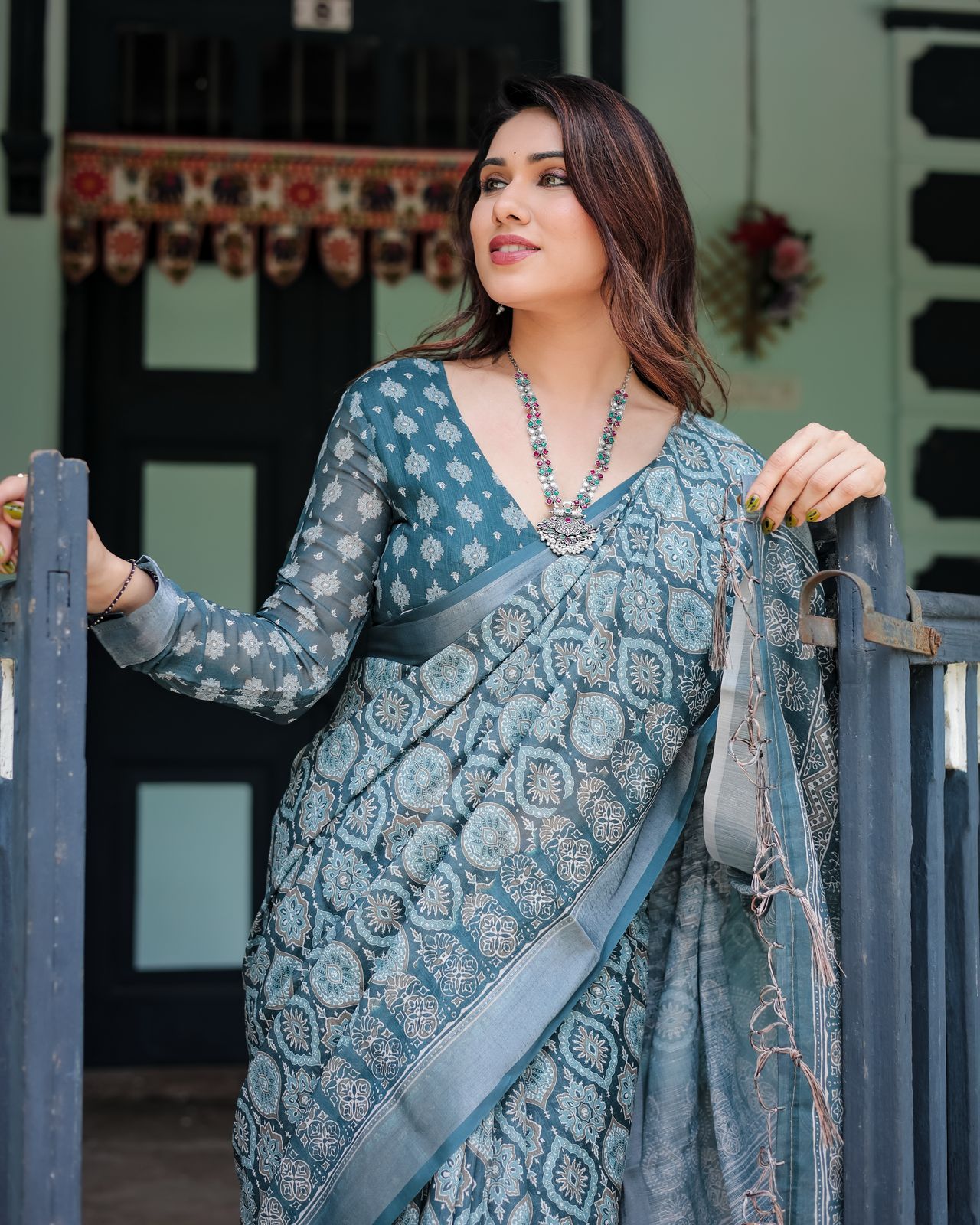 Teal blue color linen saree with blouse price