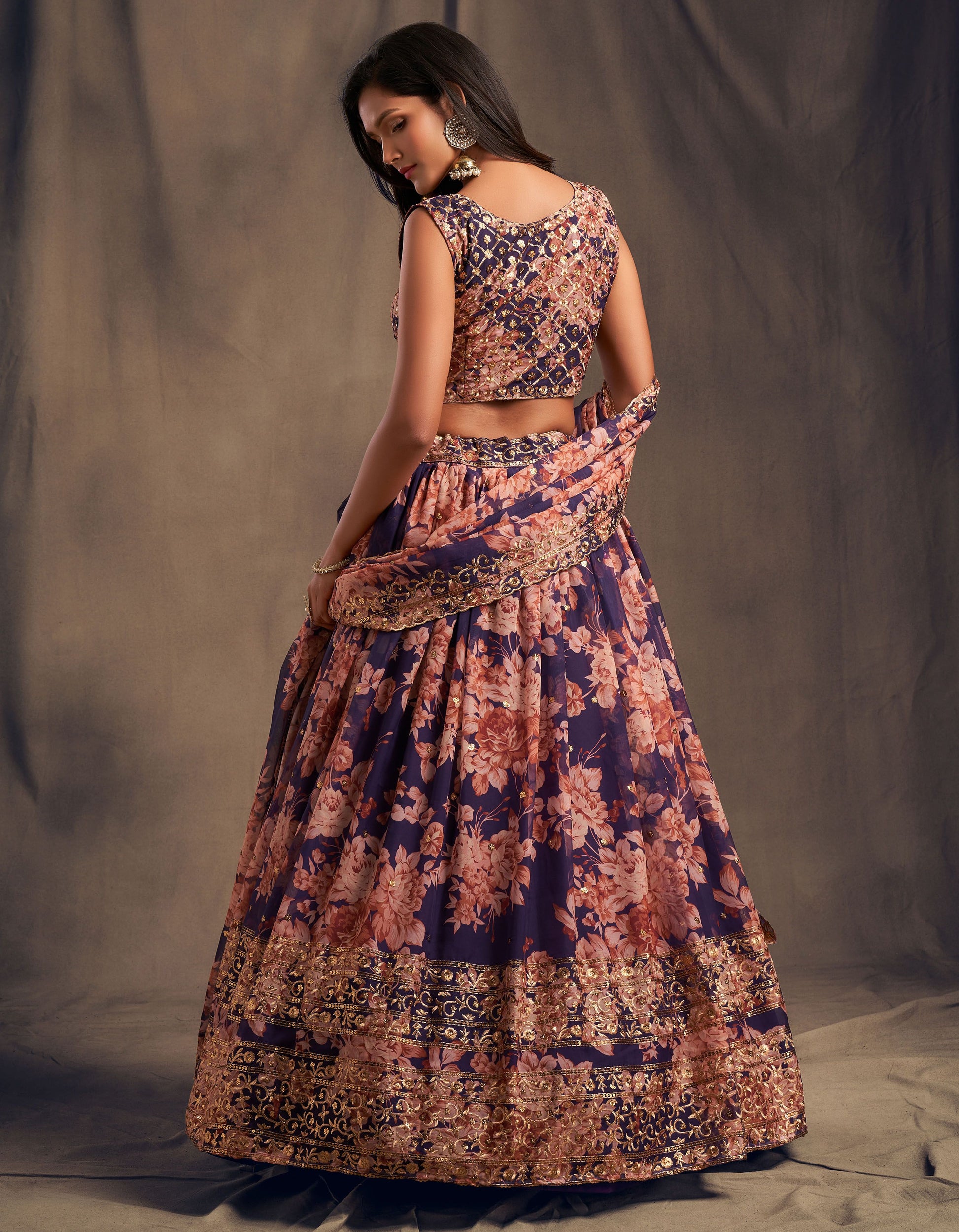 Purple color organza wedding 
lehenga choli 
