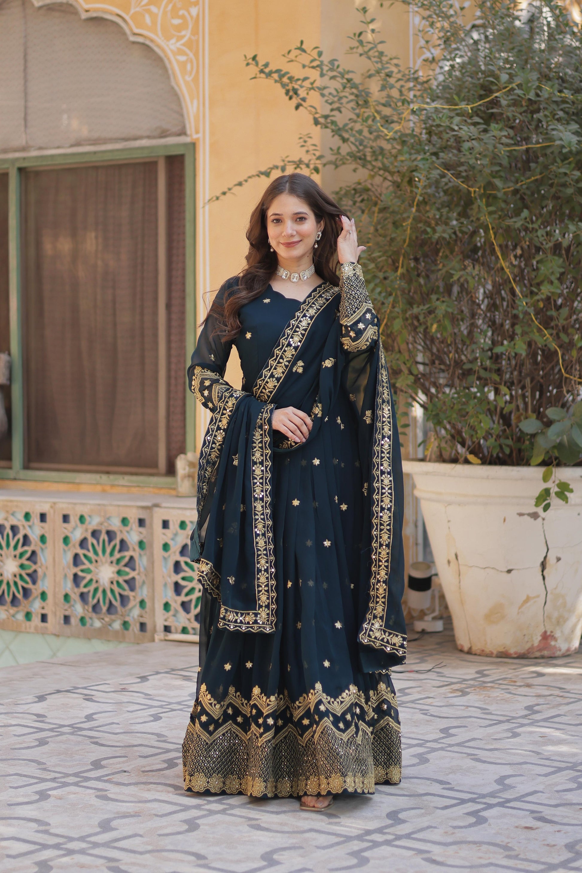 Teal blue color faux blooming anarkali gown 