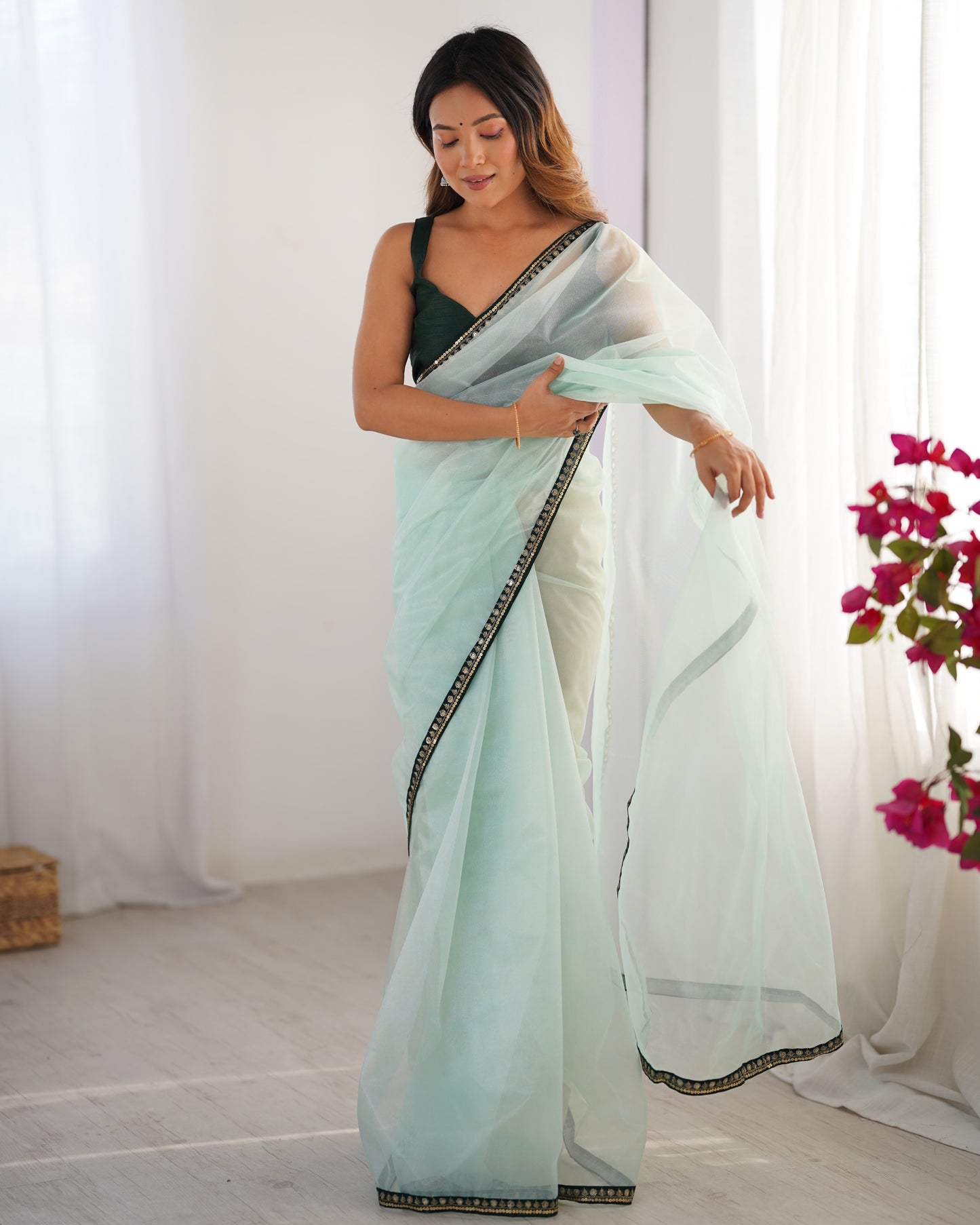 Sea green color twill net saree with blouse online