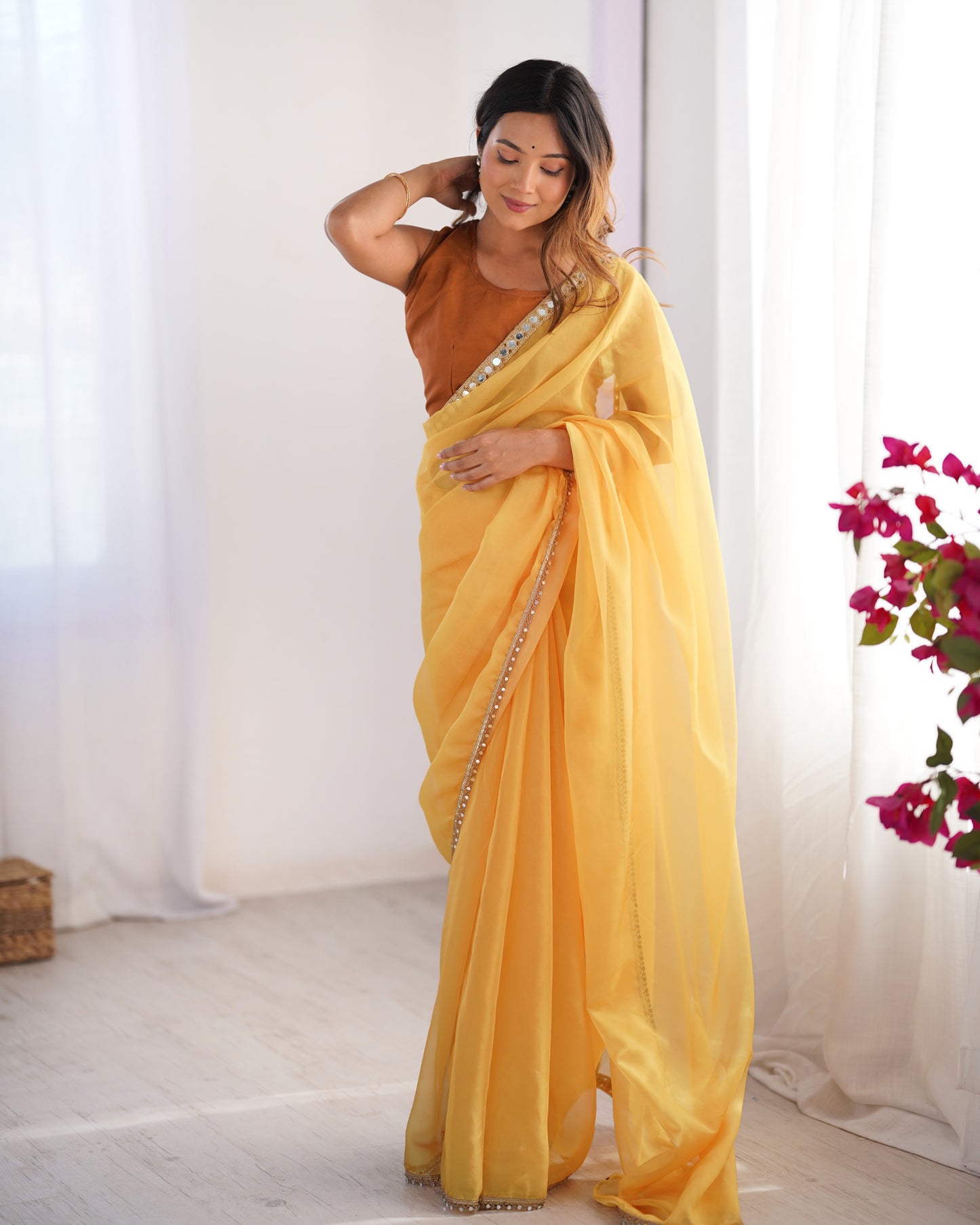 Yellow color organza saree for women