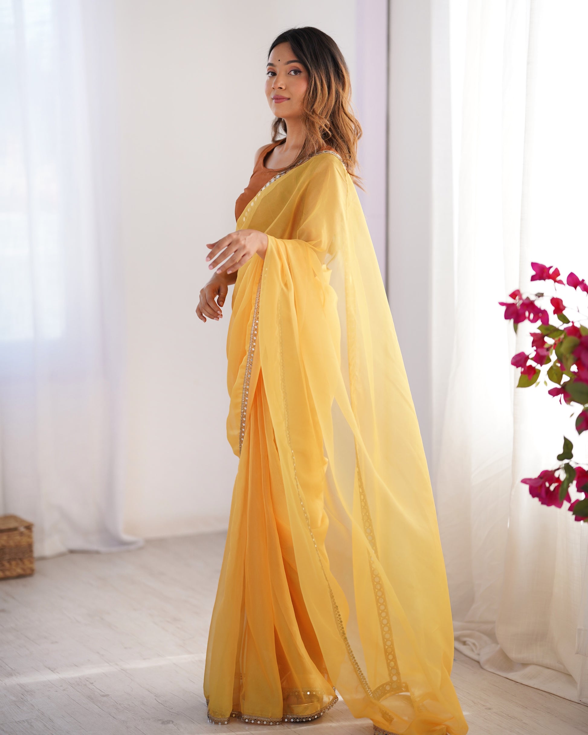 Yellow color organza saree with blouse price