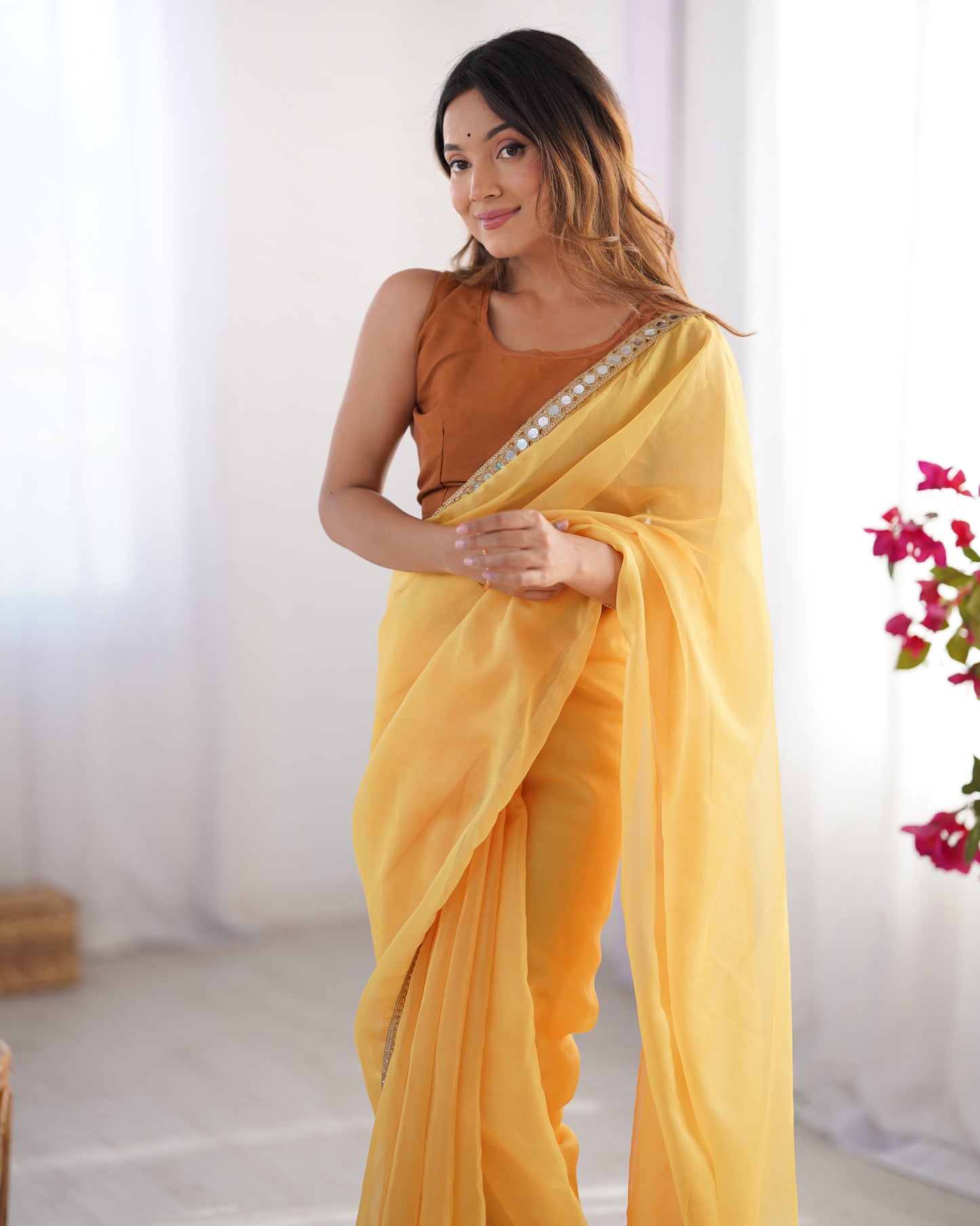 Yellow color organza saree with blouse images