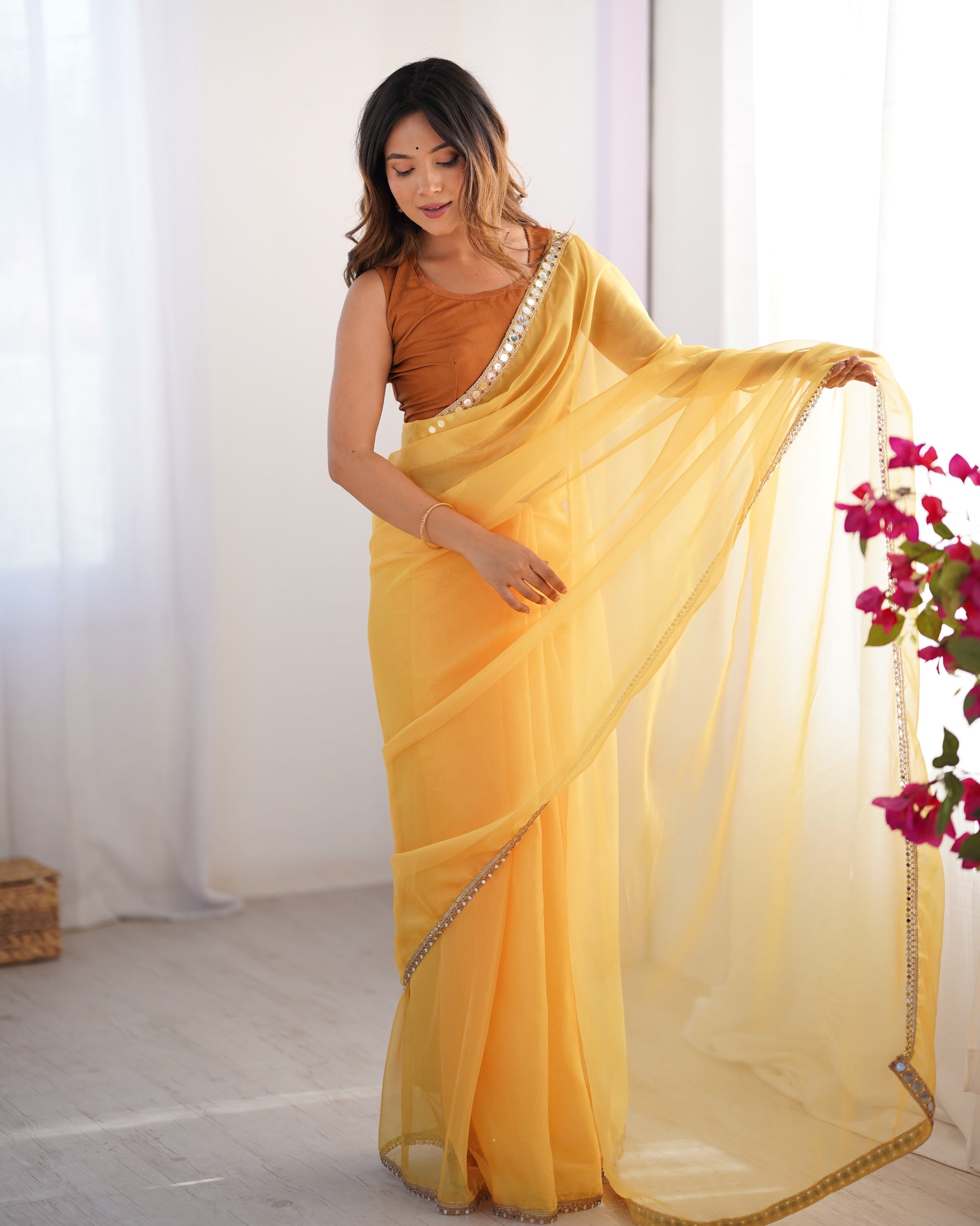 Yellow color organza saree for wedding