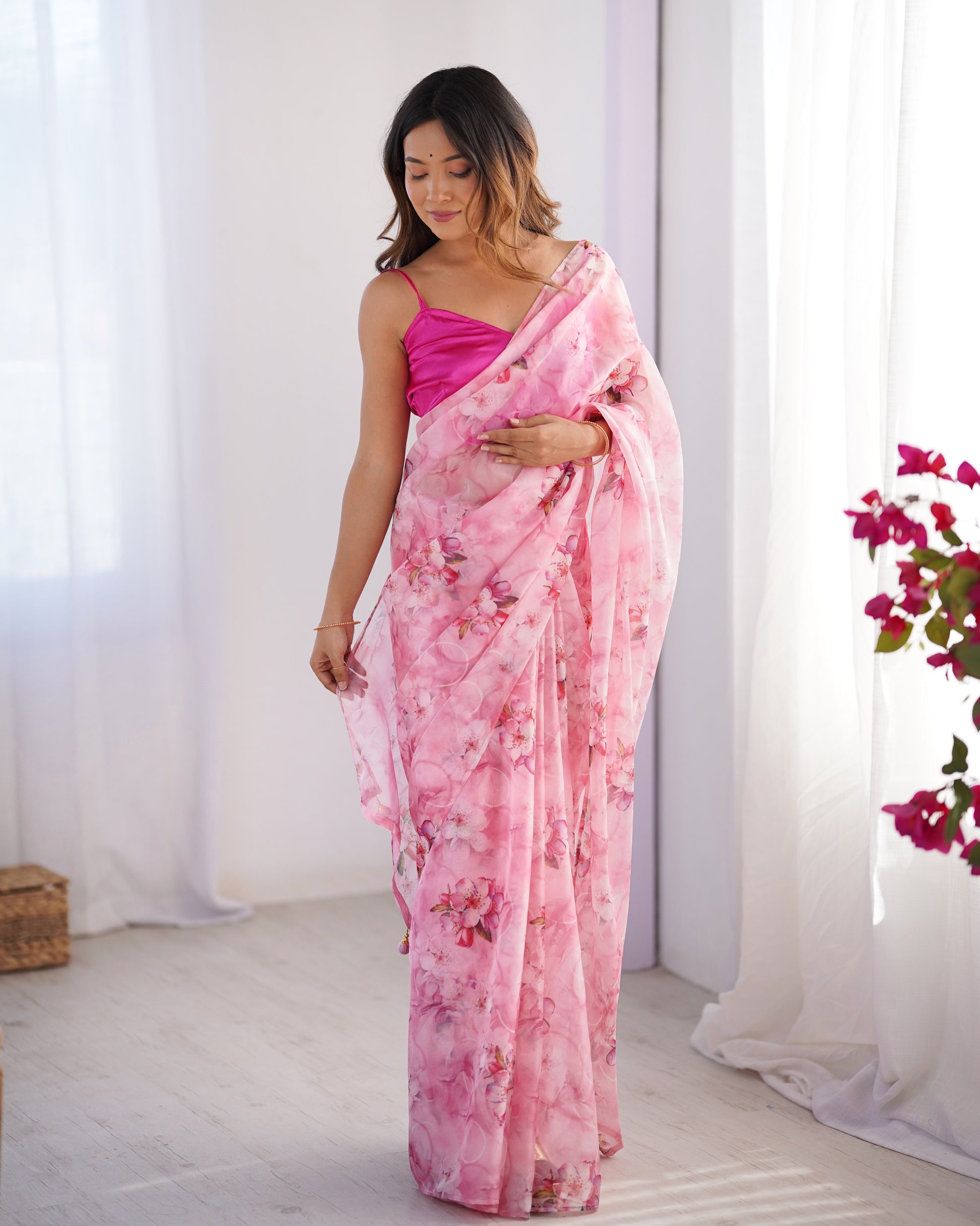 Pink color organza saree for party