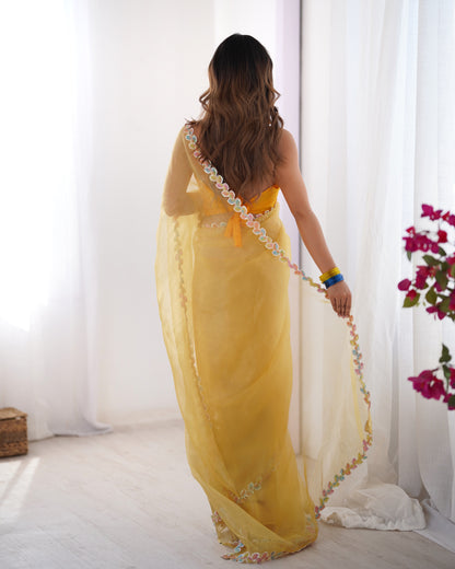 Yellow color jimmy choo saree with blouse price