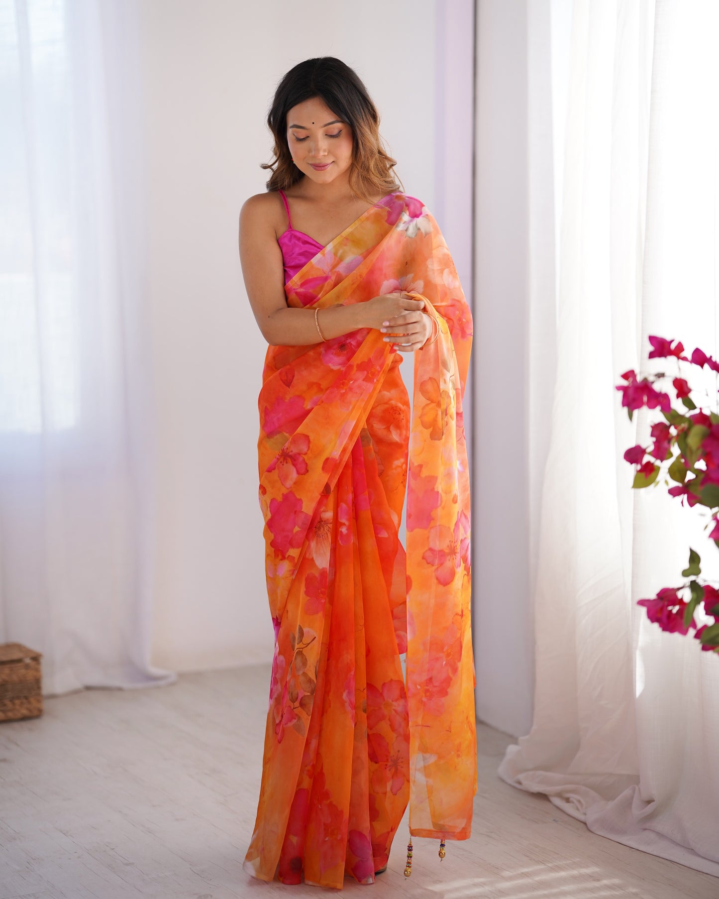 Orange color organza saree for party