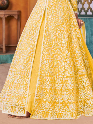 Party wear yellow net salwar suit for women