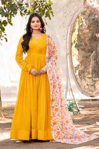 Yellow color soft organza long gown with dupatta