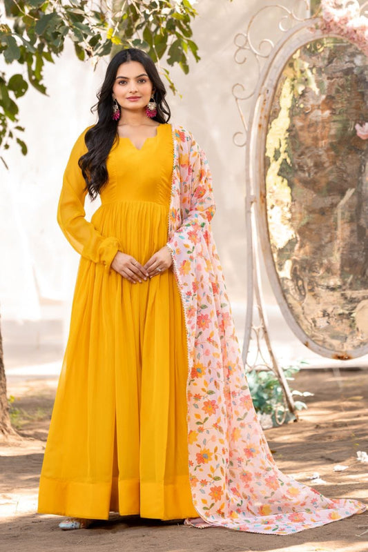 Yellow color soft organza long gown with dupatta