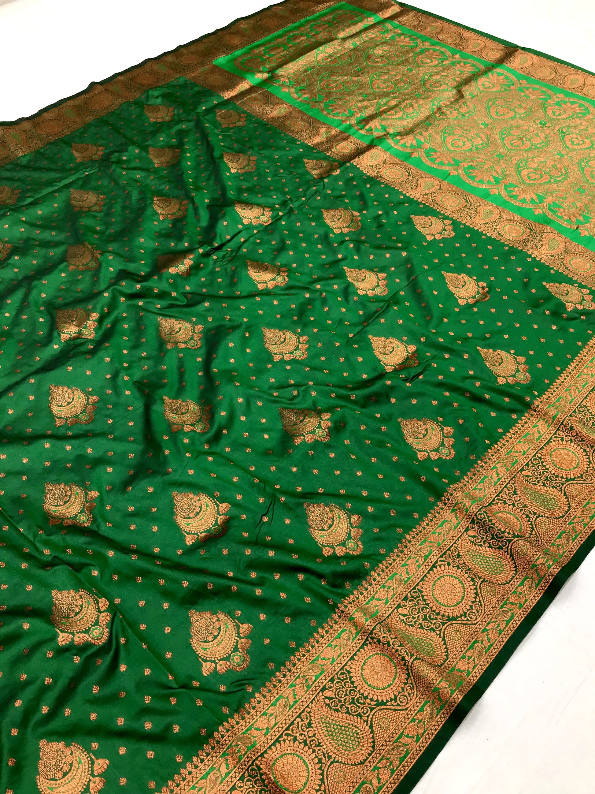Green color banarasi silk saree with blouse price
