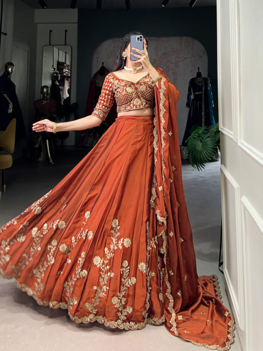 Orange color rangoli silk lehenga choli