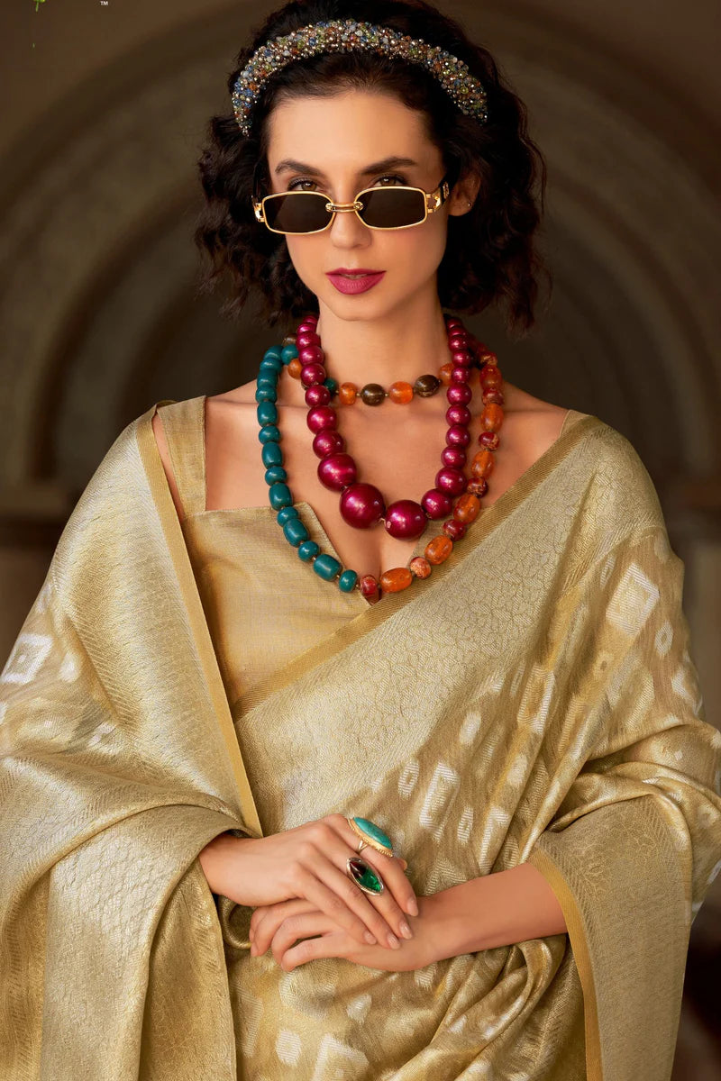 Beige color tissue silk saree for party