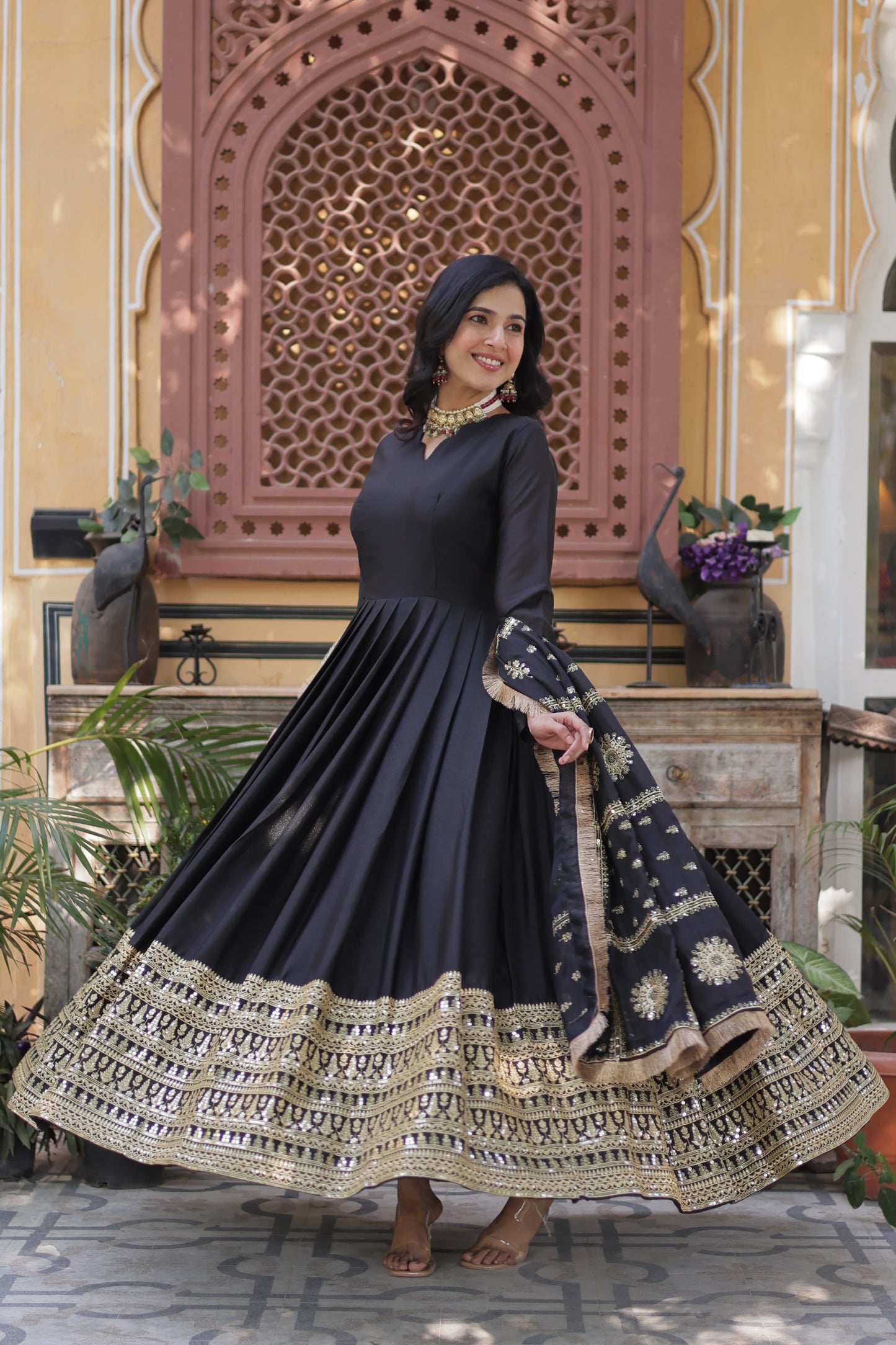 Black color georgette sequins work long gown with dupatta
