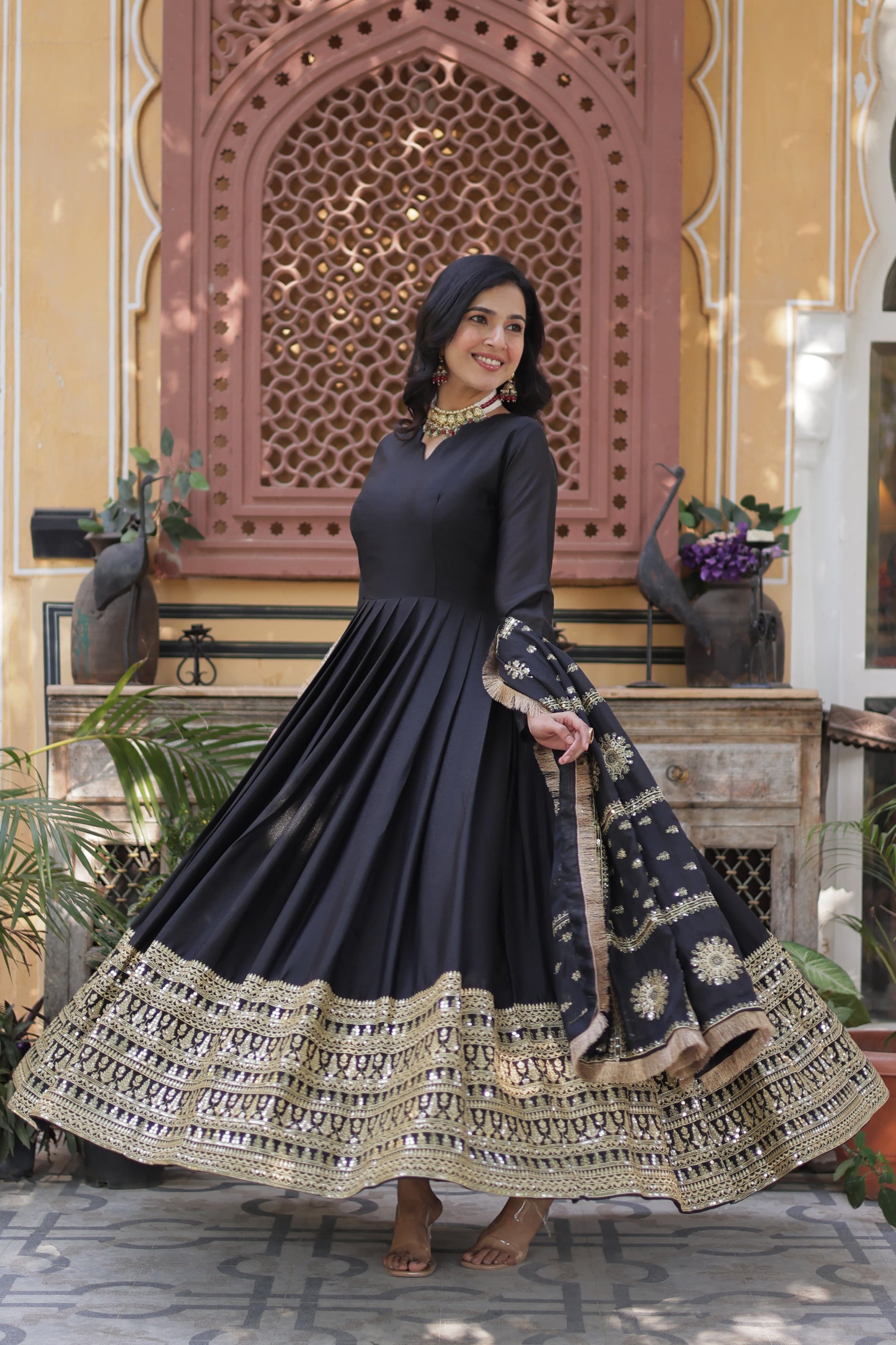 Black color georgette sequins work long gown with dupatta
