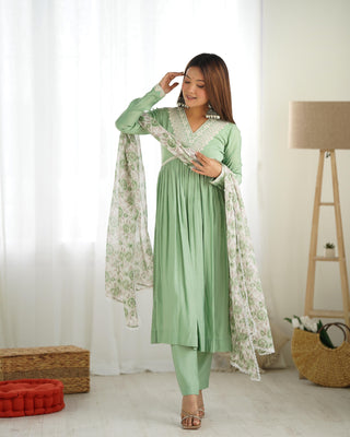 Pista color silk salwar kameez for women price
