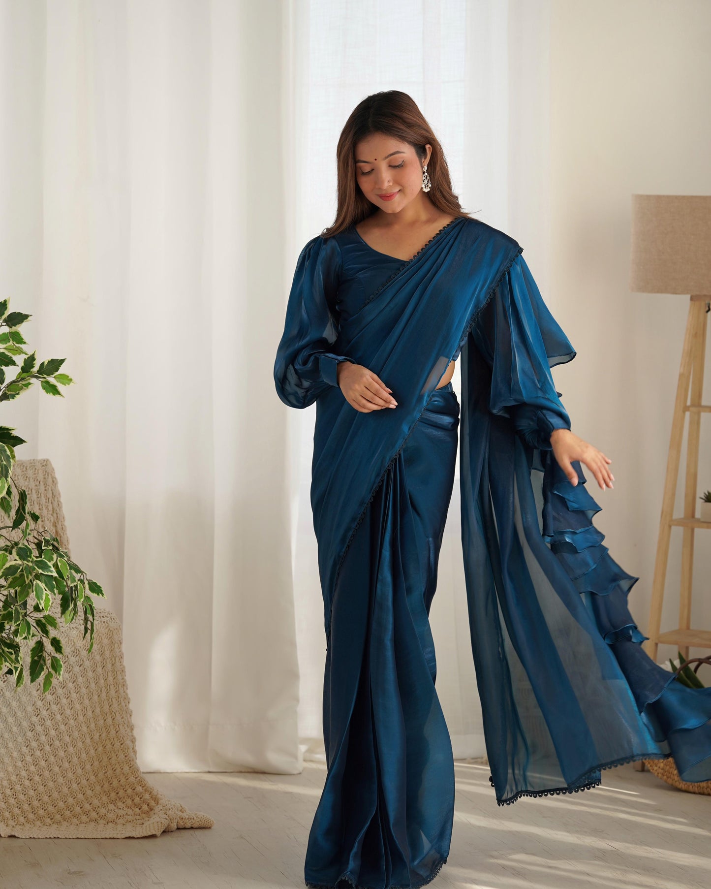 Teal blue jimmy choo saree for women images
