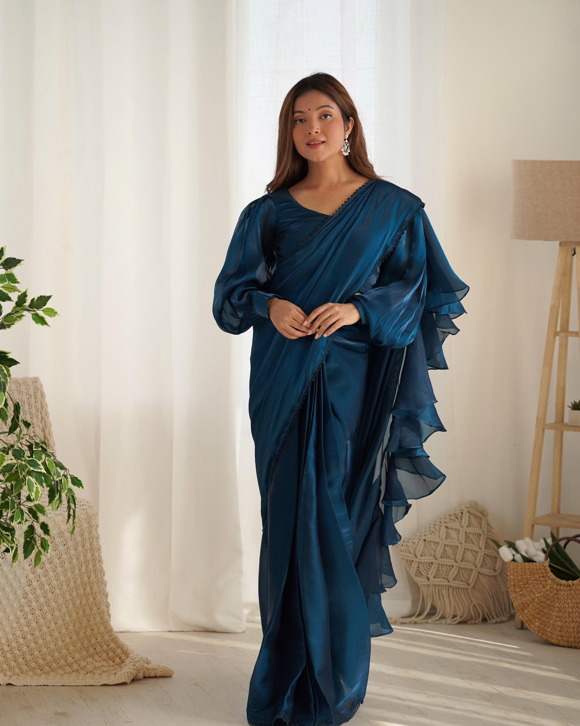Teal blue jimmy choo saree for party
