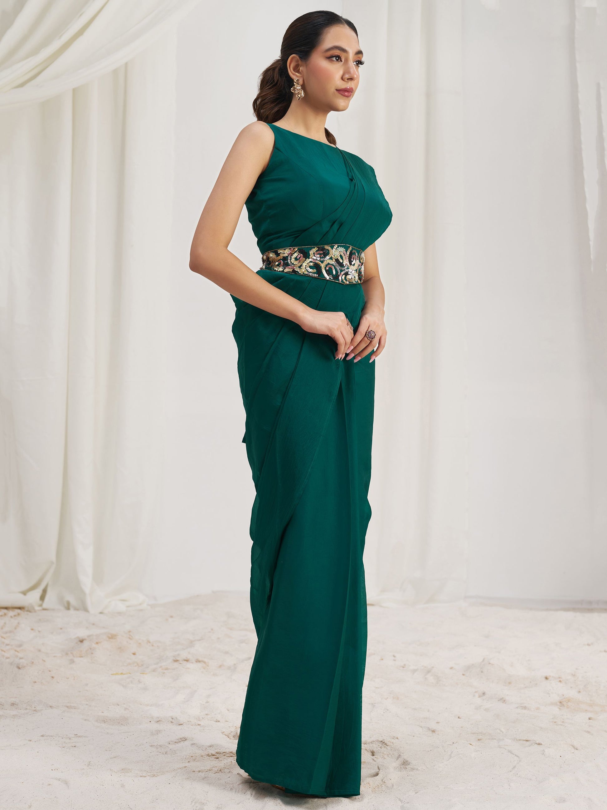Teal Green color organza saree with blouse