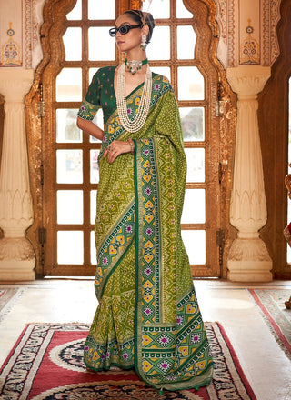 Green color silk patola printed saree price
