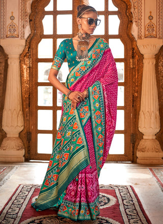 Pink color silk patola printed saree images
