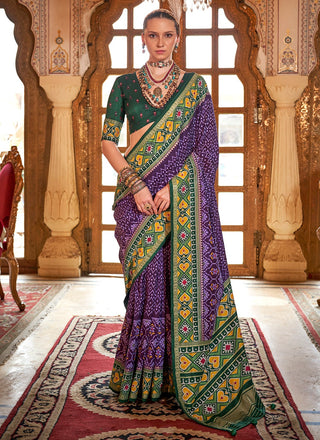 Purple color silk patola printed saree price
