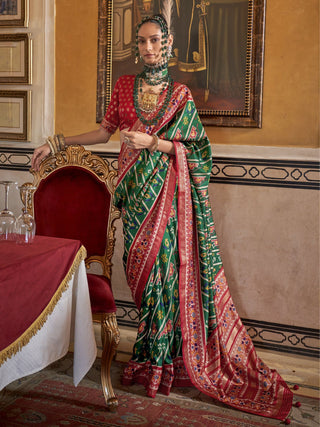 Green color silk patola printed saree price
