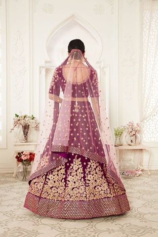 velvet purple lehenga with pink dupatta