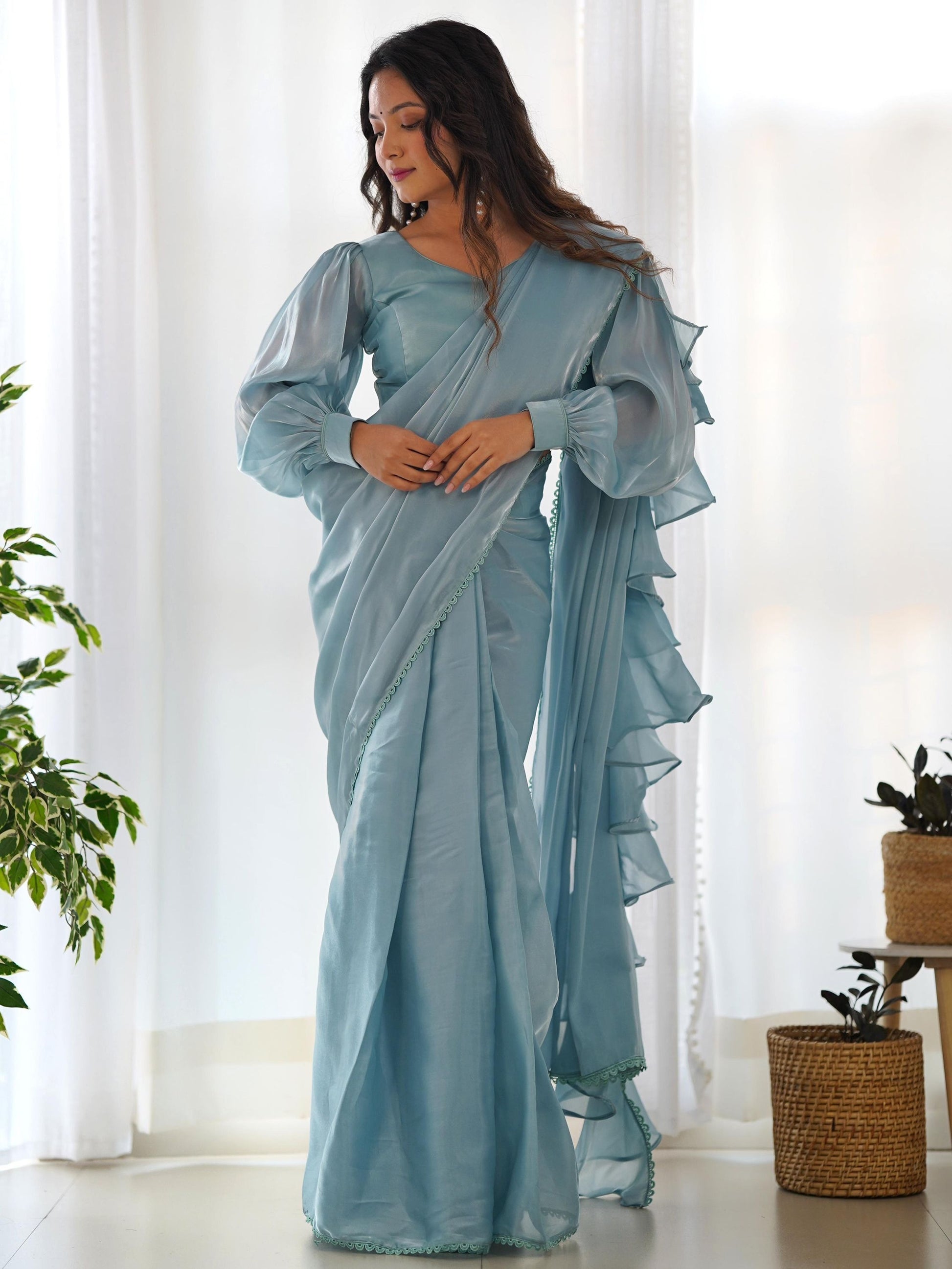 Sky color Jimmy Choo Saree design
