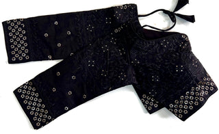 Black exclusive blouse for party wear.