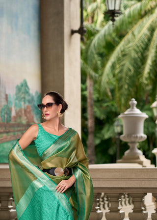 Dark green tissue saree for wedding
