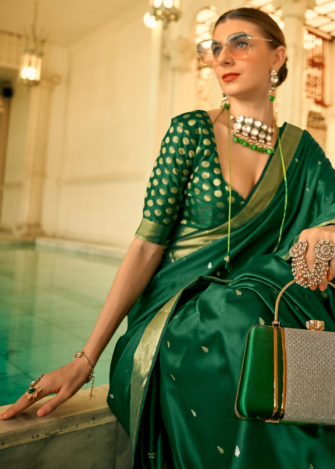 Dark green satin handwoven saree
