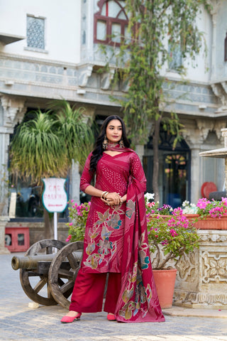 Red color roman silk sharara suit design
