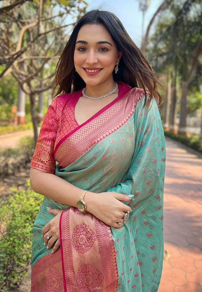 Rama color tissue zari weaving saree images
