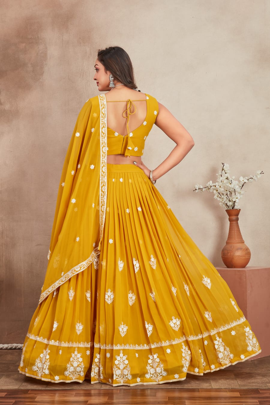 Yellow color georgette sequins work lehenga choli images