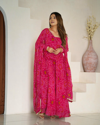 Pink color chiffon bandhej long gown for party