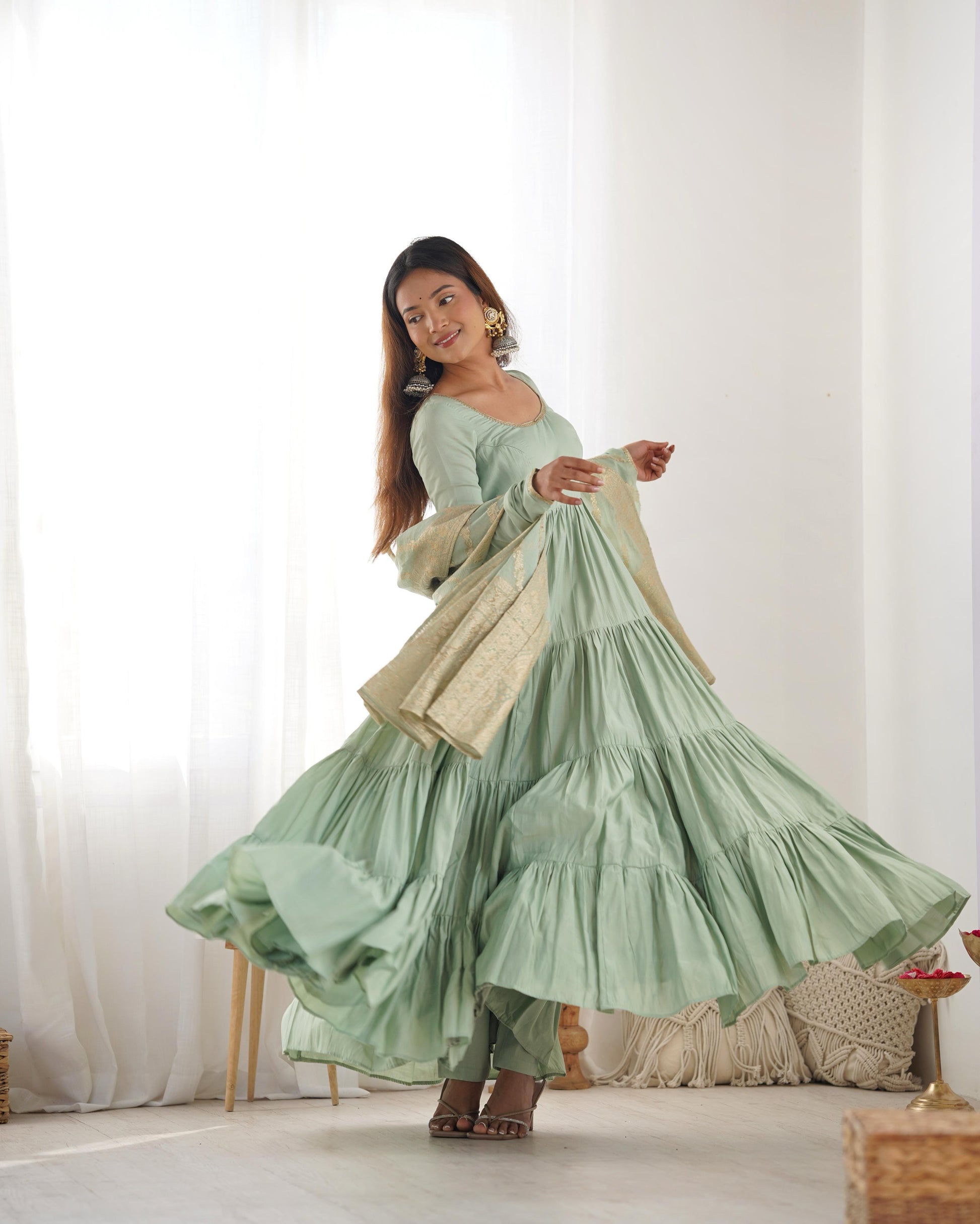 Pista color roman silk chanderi gown images

