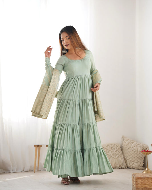 Pista color roman silk chanderi gown for party
