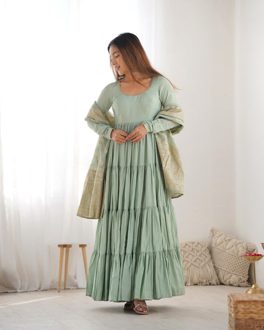 Pista color roman silk chanderi gown for women price
