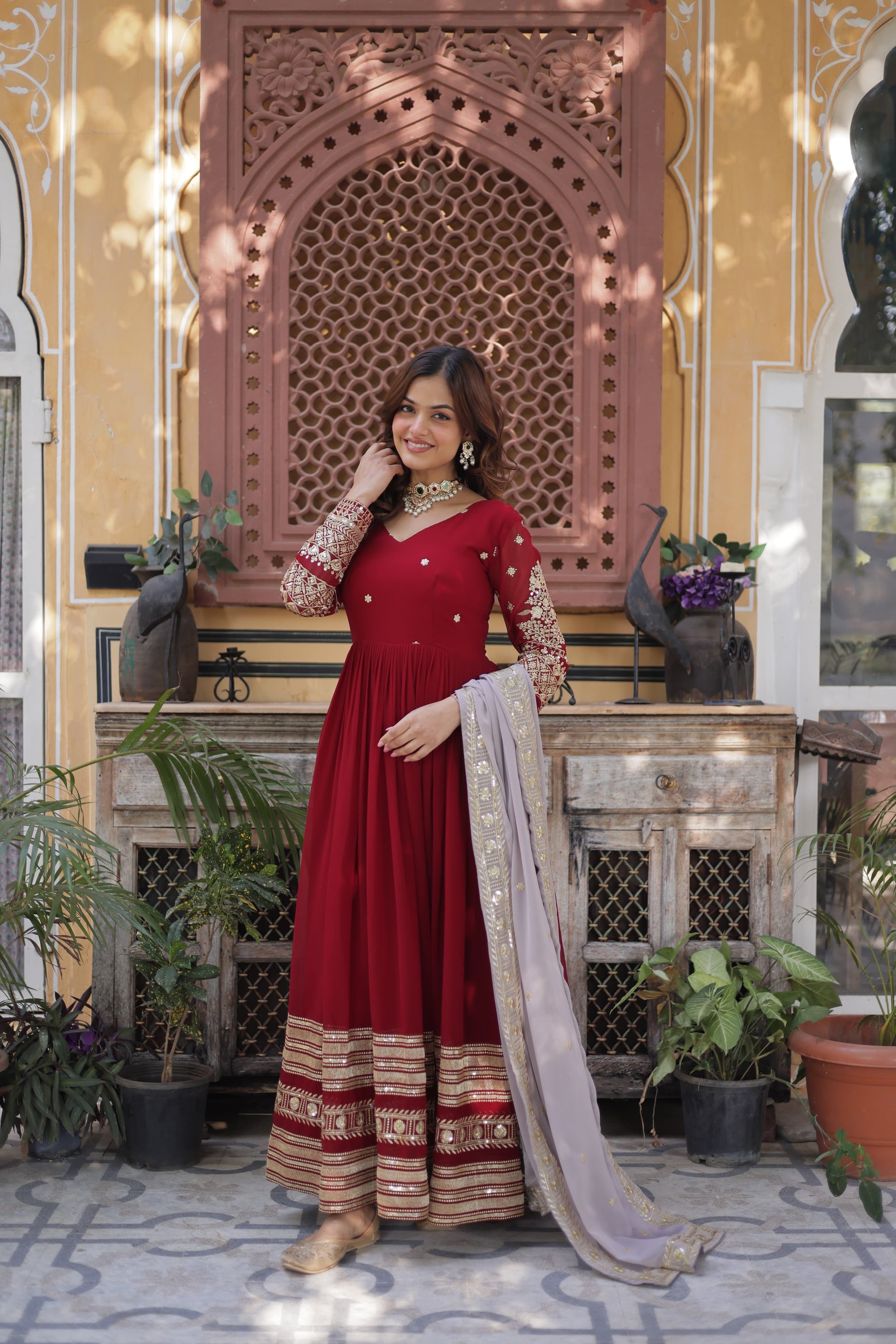 Red color faux blooming long gown with dupatta design