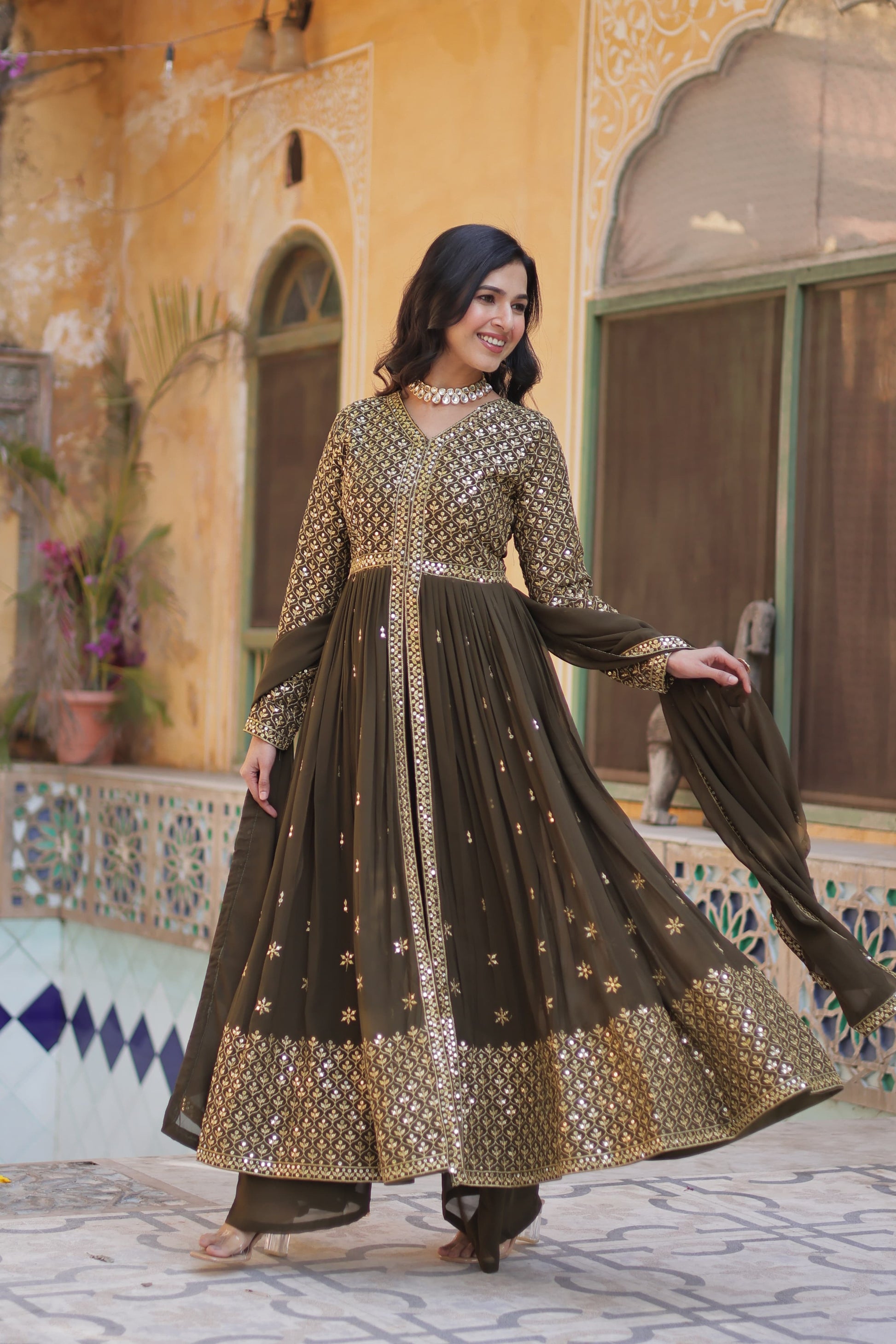 Green color georgette sharara suit with dupatta images