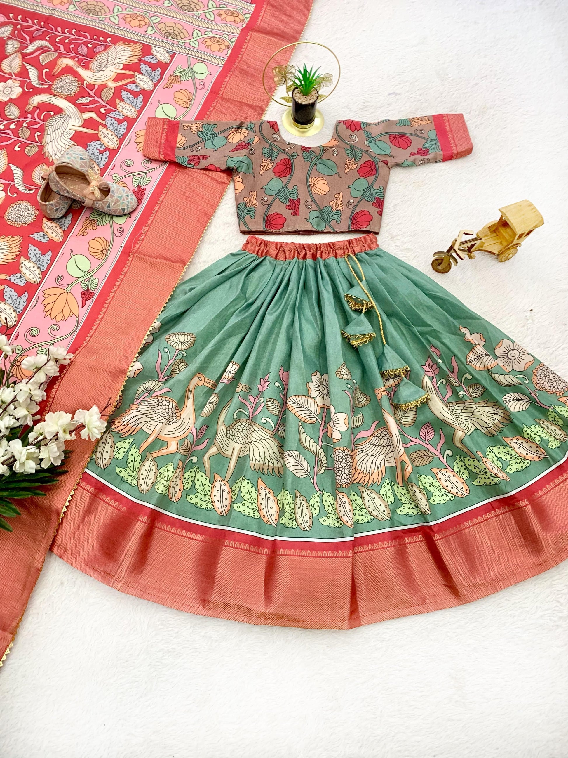 Green color dola silk kalamkari printed lehenga choli with dupatta online